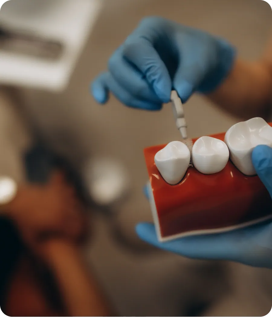 Patient smiling with a new dental bridge