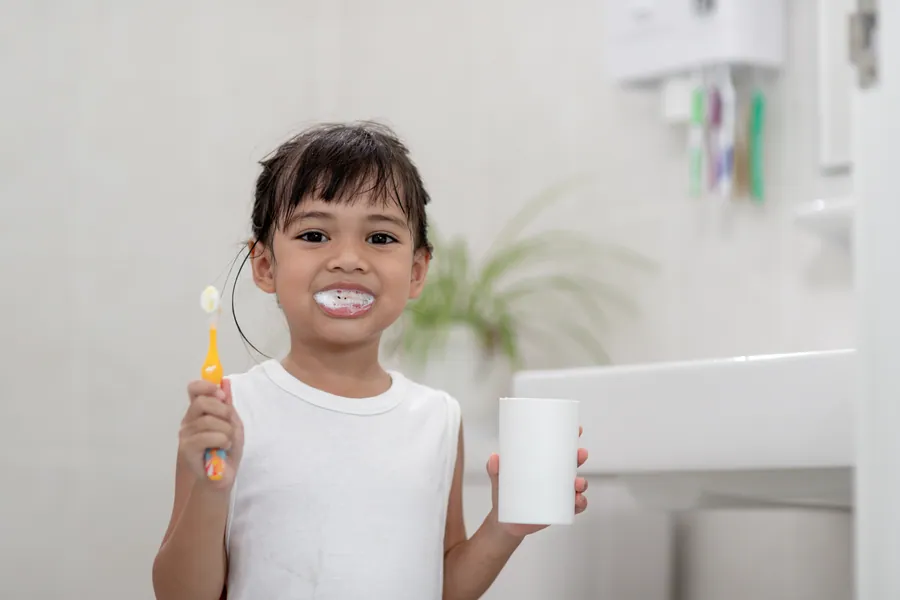 Child smiling at the dentist