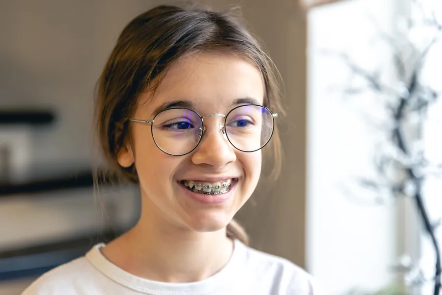 Child smiling with braces