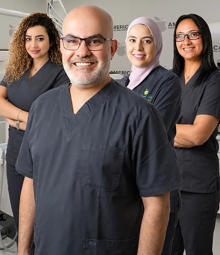 Dr. Wael Baydoun with the AMDC dental team